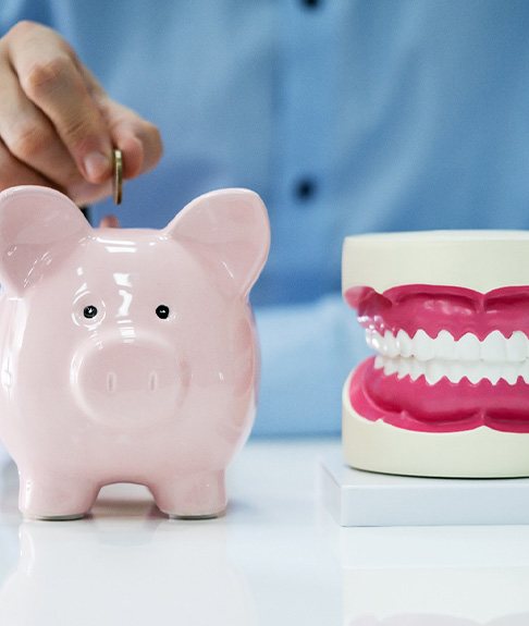 Patient in Lakewood budgeting for dentures