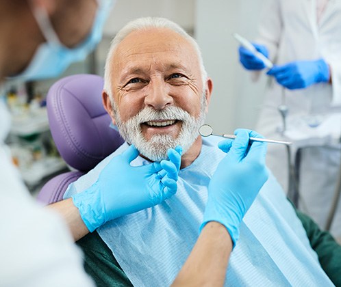 Man smiling in the dental chair