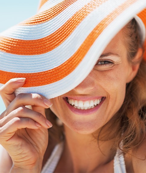 Someone on a beach with a nice smile