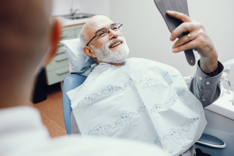 Man smiling at dental checkup